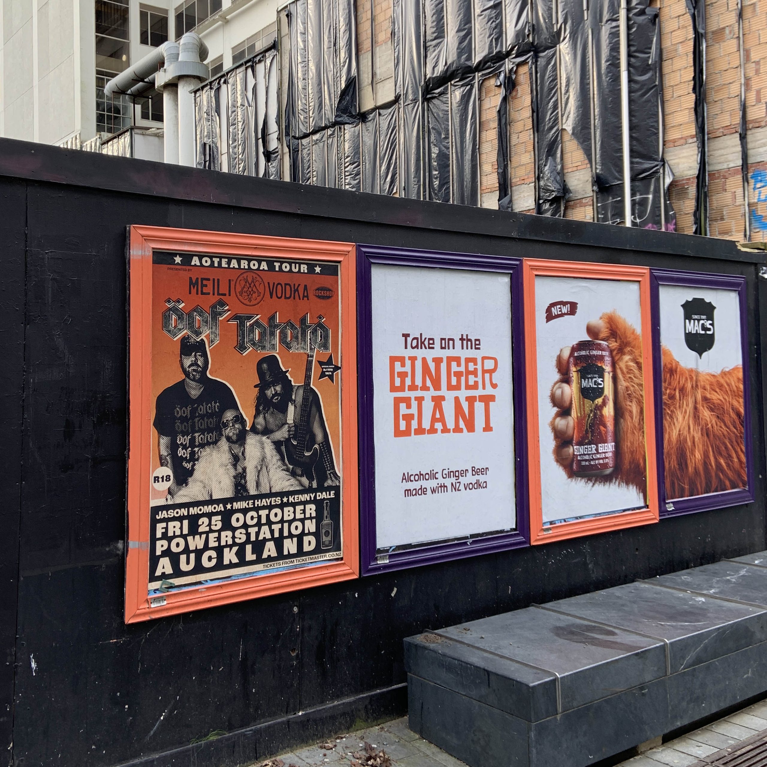 posters on fence